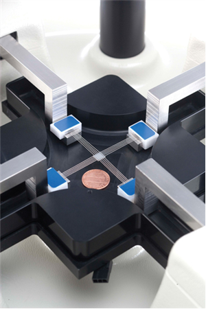 Biorakes with tissue mounted on a BioTester. The sample size is much smaller than a US penny